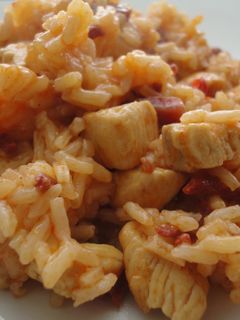 Una foto de Arroz meloso de pollo, chorizo y jamón