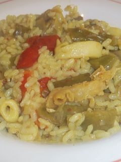 Una foto de Arroz meloso de verduras y sepia