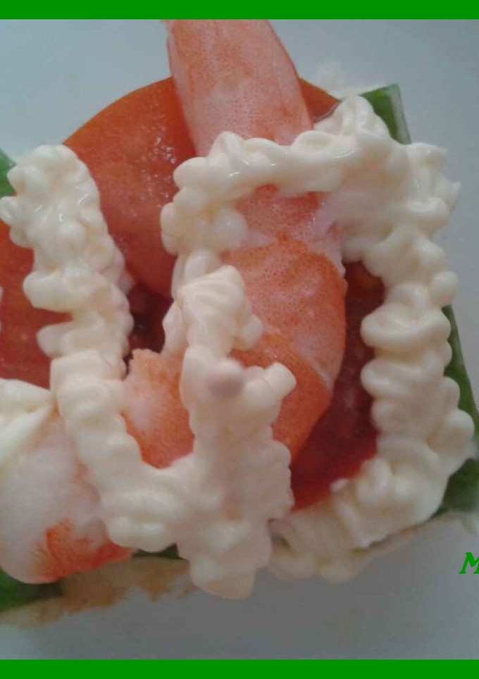 Una foto de Canapé de langostinos
