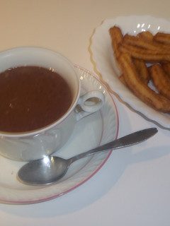 Una foto de Chocolate a la taza para comer con churros