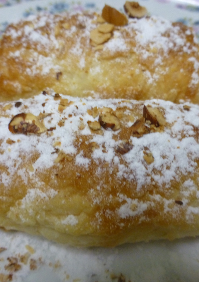 Una foto de Canutillos rellenos de crema de arroz