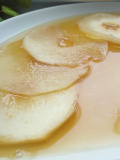 Foto principal de Carpaccio de peras sobre gelee de té negro