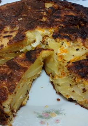 Una foto de Tortilla de papas y zanahoria