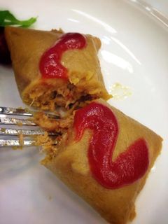 Una foto de Pasteles en hojas de yuca y plátano maduro