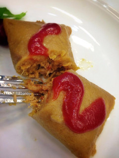 Una foto de Pasteles en hojas de yuca y plátano maduro