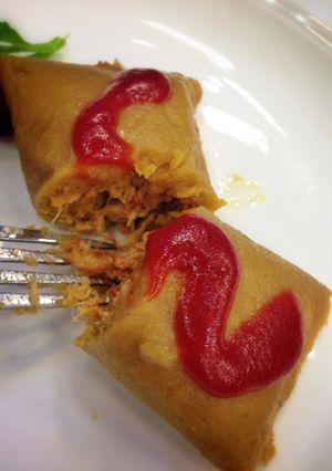 Una foto de Pasteles en hojas de yuca y plátano maduro