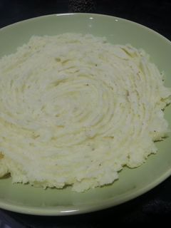Una foto de Puré de patata con queso