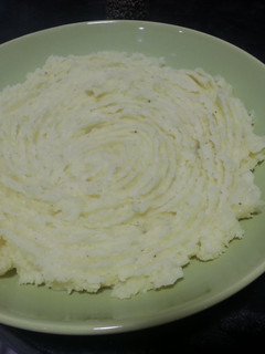 Una foto de Puré de patata con queso