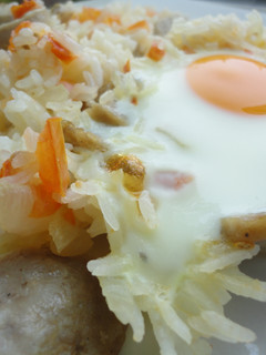 Una foto de Arroz al horno con huevos estrellados