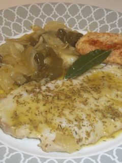 Una foto de Marrajo con salsa de cebolla