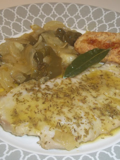 Una foto de Marrajo con salsa de cebolla