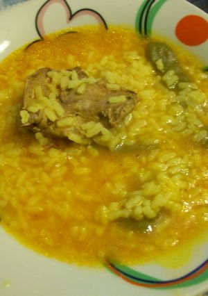 Una foto de Arroz caldoso con conejo