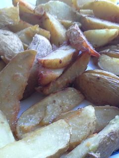 Una foto de Gajos de patata con orégano y pimentón