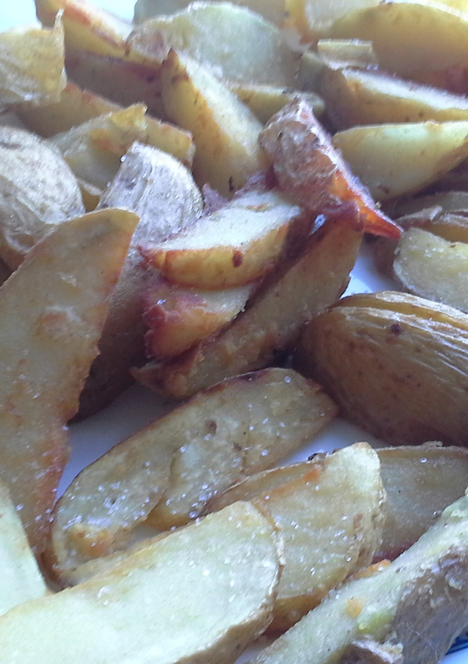 Una foto de Gajos de patata con orégano y pimentón