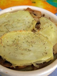 Una foto de Horneado de patatas y champiñones