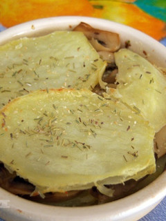 Una foto de Horneado de patatas y champiñones