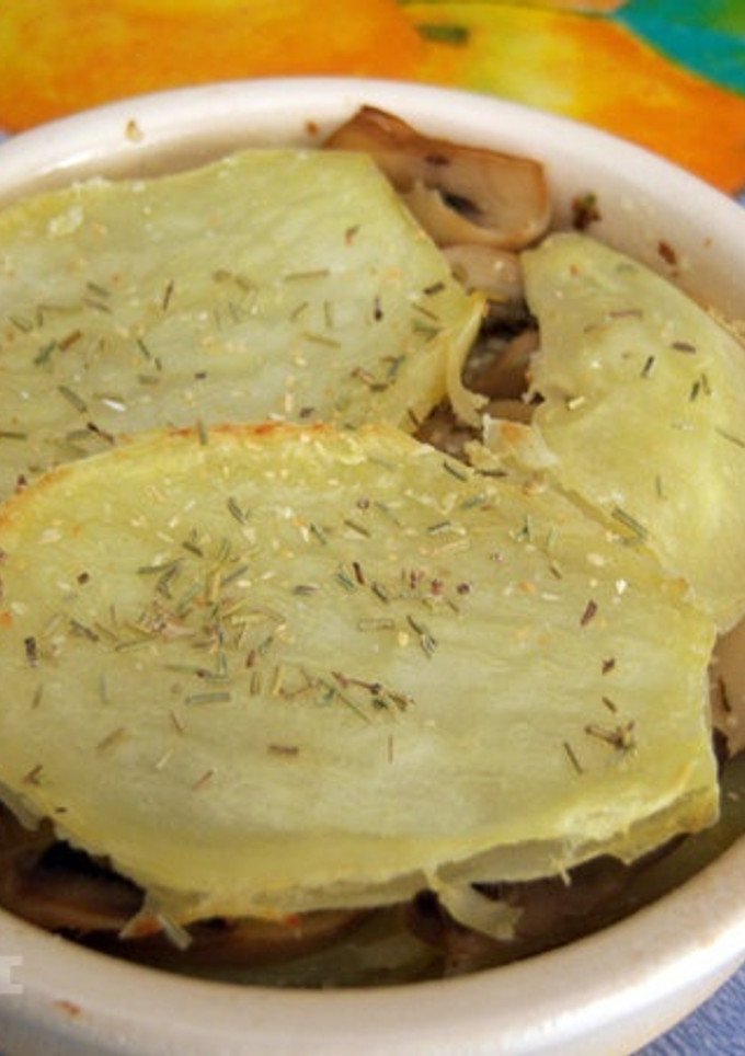 Una foto de Horneado de patatas y champiñones