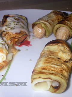 Foto principal de Rollitos de berenjena con queso/tofu/tomate