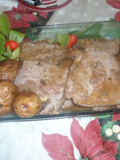 Una foto de Trozo de carne mechada tipo Mexico