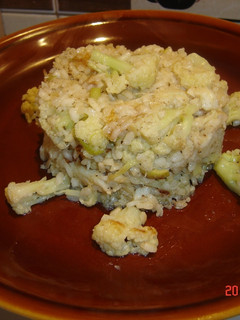 Una foto de Arroz con bacalao y coliflor