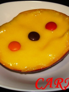 Una foto de Barca de helado de mango y sorbete de piña