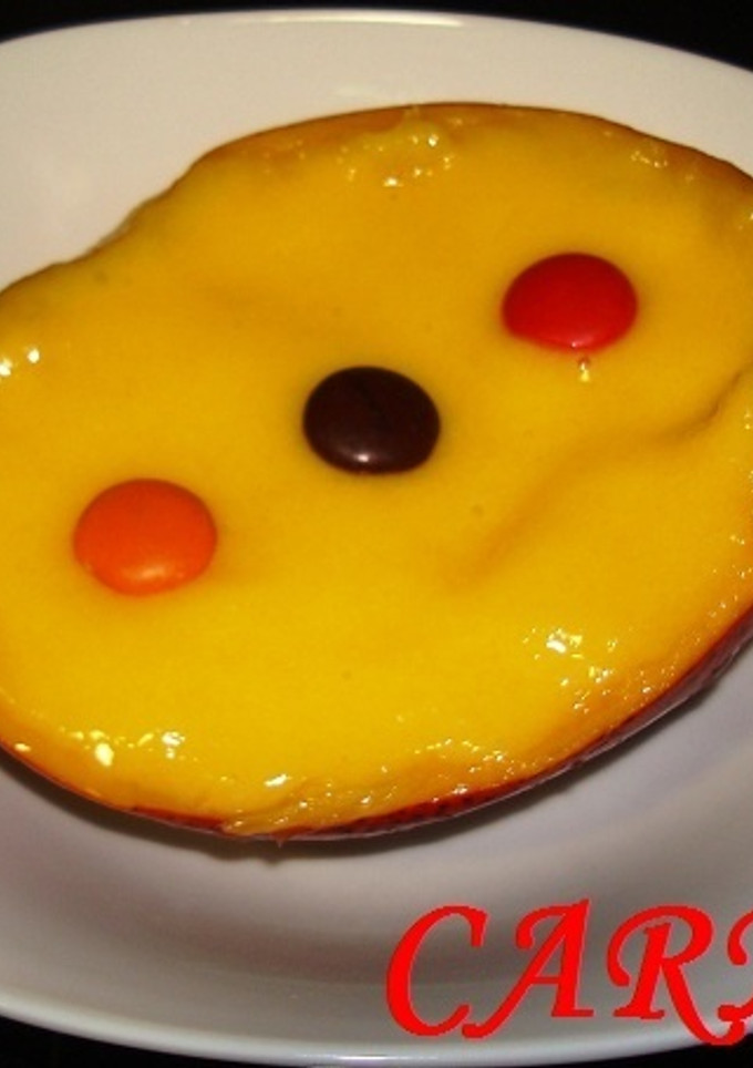 Una foto de Barca de helado de mango y sorbete de piña 
