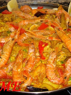 Una foto de Paella mar y montaña Carme