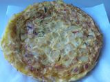 Tortilla de patatas con cebolla y pimientos