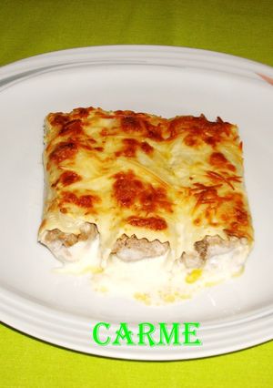 Una foto de Canelones caseros con ternera, cerdo y pollo