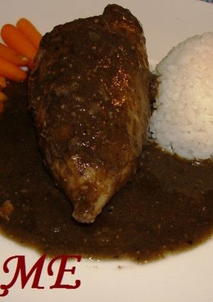 Una foto de Calamares rellenos en su tinta