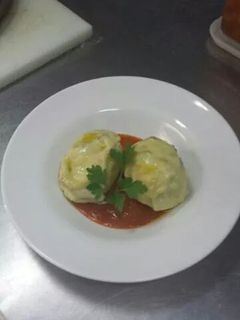 Una foto de Papas rellenas de carne y queso