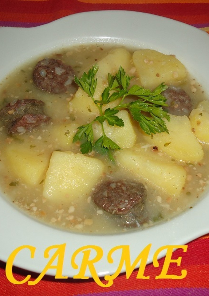 Una foto de Patatas cocidas con botifarra negra
