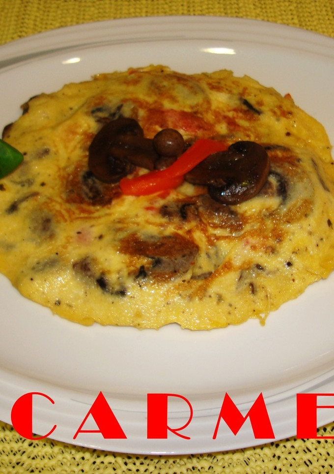 Una foto de Tortilla de champiñones y pimiento asado