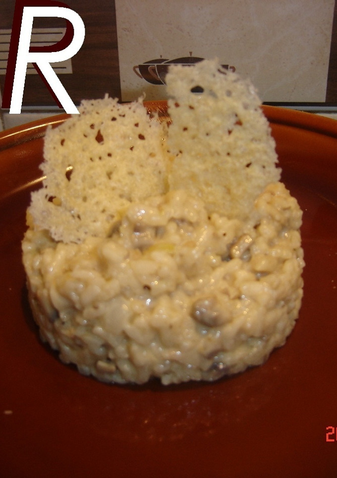 Una foto de Risotto con setas y vino