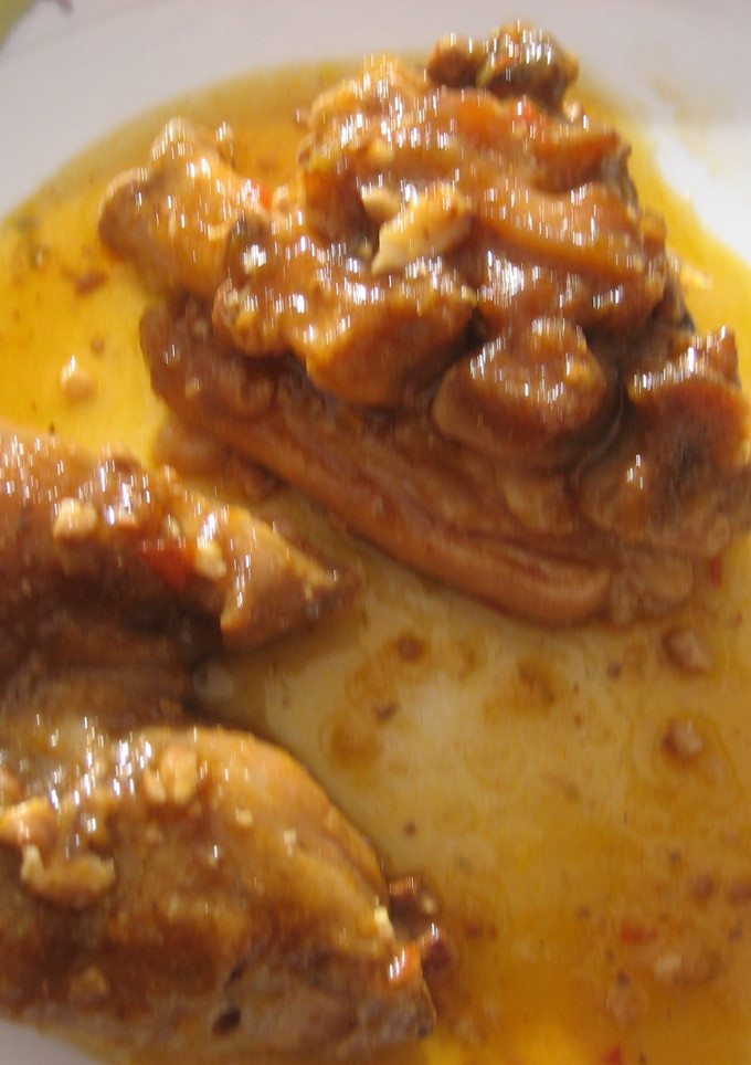Una foto de Manitas de cerdo en salsa con cerveza