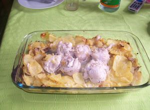 Una foto de Colita de cuadril con salsa de ajo y pimientos en corona de verduras