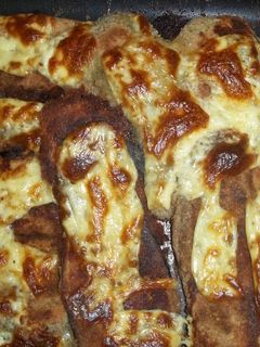 Una foto de Milanesas de berenjenas al horno