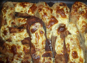 Una foto de Milanesas de berenjenas al horno