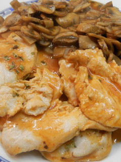 Una foto de Filetes de pavo con champiñones