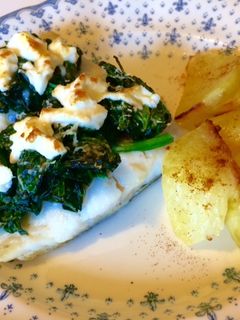 Una foto de Bacalao a la espalda gratinado con espinacas