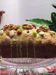 Una foto de Plum-cake navideño con azucarado de naranja