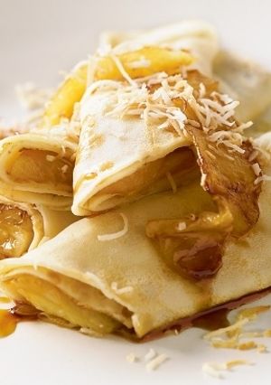 Una foto de Crepes de piña y coco