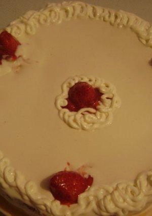 A picture of Colombian Tres Leches Cake Decorated with Strawberries.