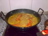 Arroz con bogavante, chirlas y calamares
