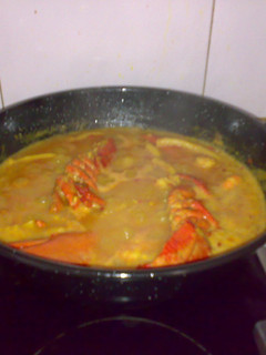 Una foto de Arroz con bogavante, chirlas y calamares