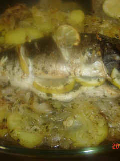 Una foto de Lubina, dorada o besugo al horno