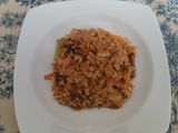 Cuscús con especias, champiñones y cebolla