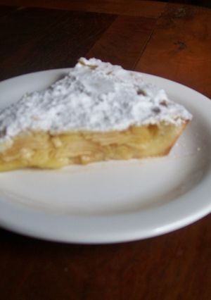 Una foto de Tarta de manzana, pasas y canela