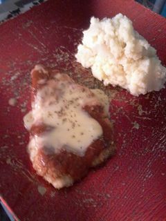 Una foto de Milanesa de pollo a la napolitana