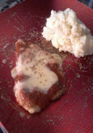 Una foto de Milanesa de pollo a la napolitana